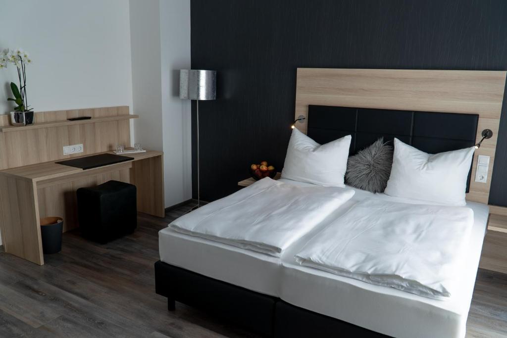 Postel nebo postele na pokoji v ubytování Hotel Schlafplatz