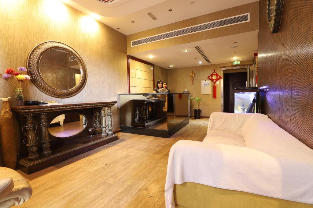 Postel nebo postele na pokoji v ubytování Mughal Suites