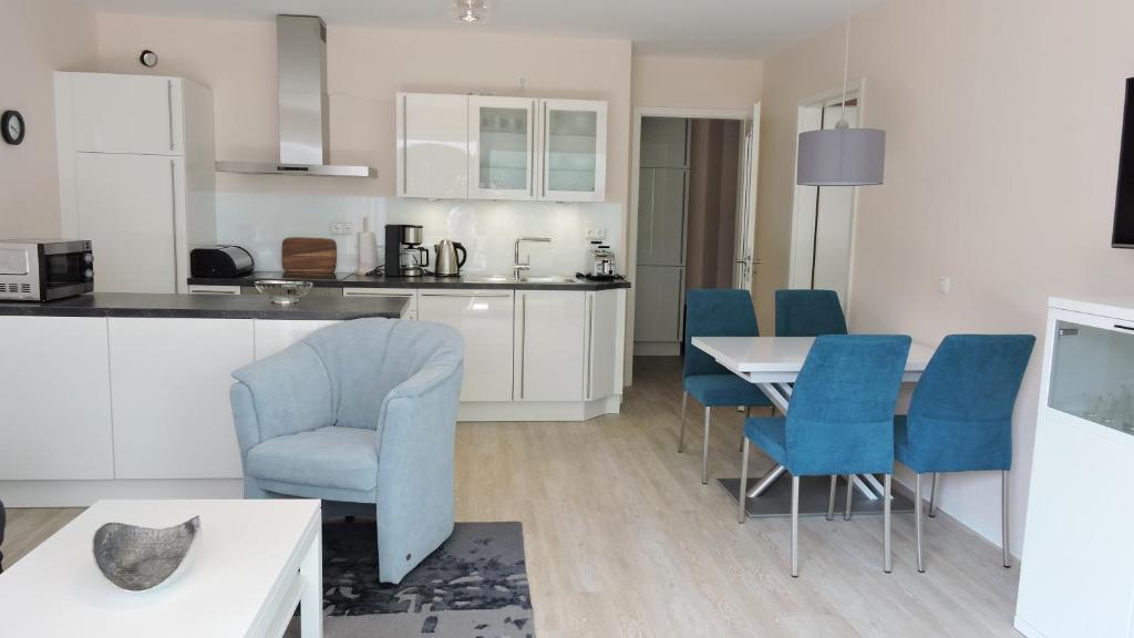 Kuchyň nebo kuchyňský kout v ubytování Ferienwohnung Timmendorfer