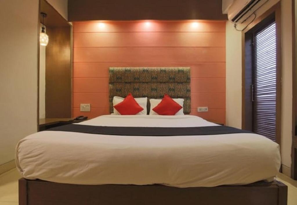 Postel nebo postele na pokoji v ubytování Tangerine Boutique Resort