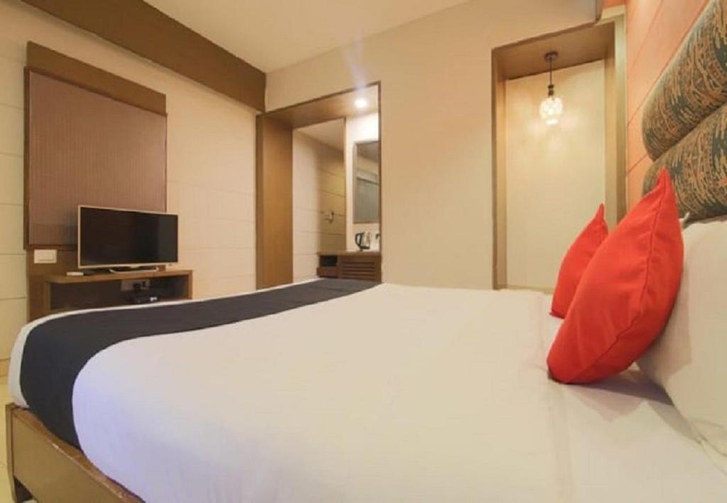 TV a/nebo společenská místnost v ubytování Tangerine Boutique Resort