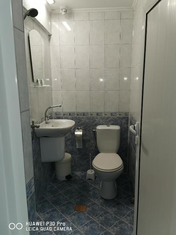Koupelna v ubytování Hotel Belisimo