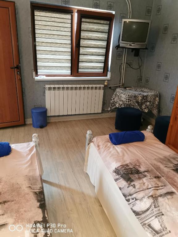 Postel nebo postele na pokoji v ubytování Hotel Belisimo