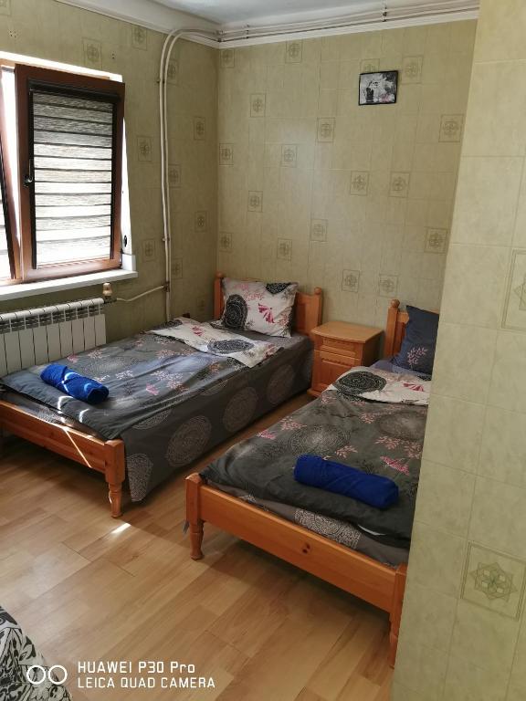 Postel nebo postele na pokoji v ubytování Hotel Belisimo