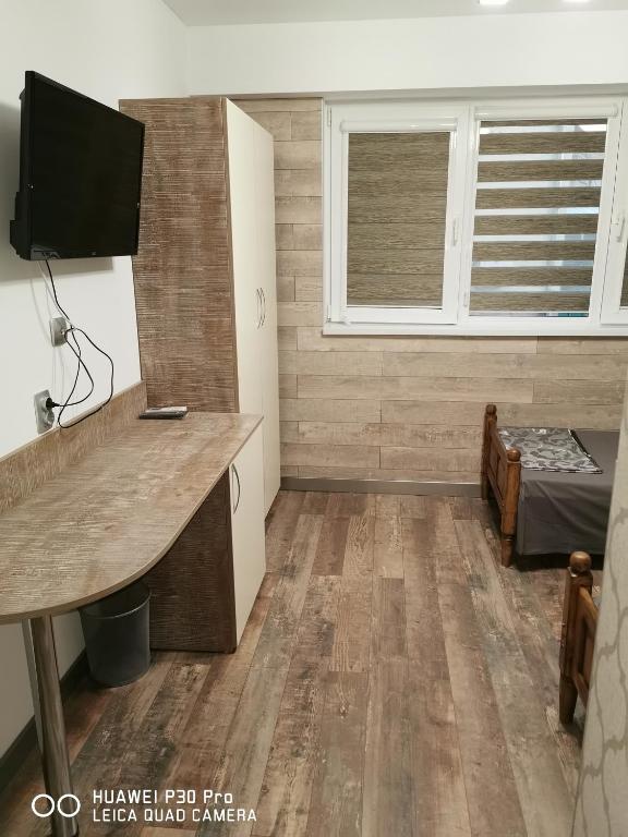 TV a/nebo společenská místnost v ubytování Hotel Belisimo