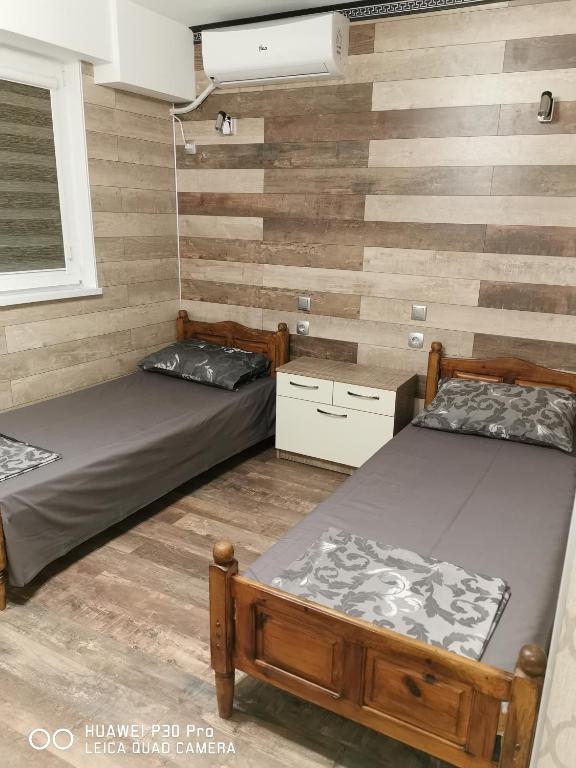 Postel nebo postele na pokoji v ubytování Hotel Belisimo
