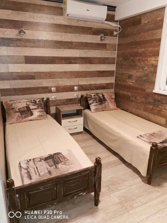 Postel nebo postele na pokoji v ubytování Hotel Belisimo