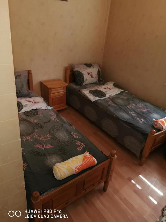 Postel nebo postele na pokoji v ubytování Hotel Belisimo