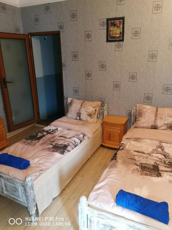 Postel nebo postele na pokoji v ubytování Hotel Belisimo