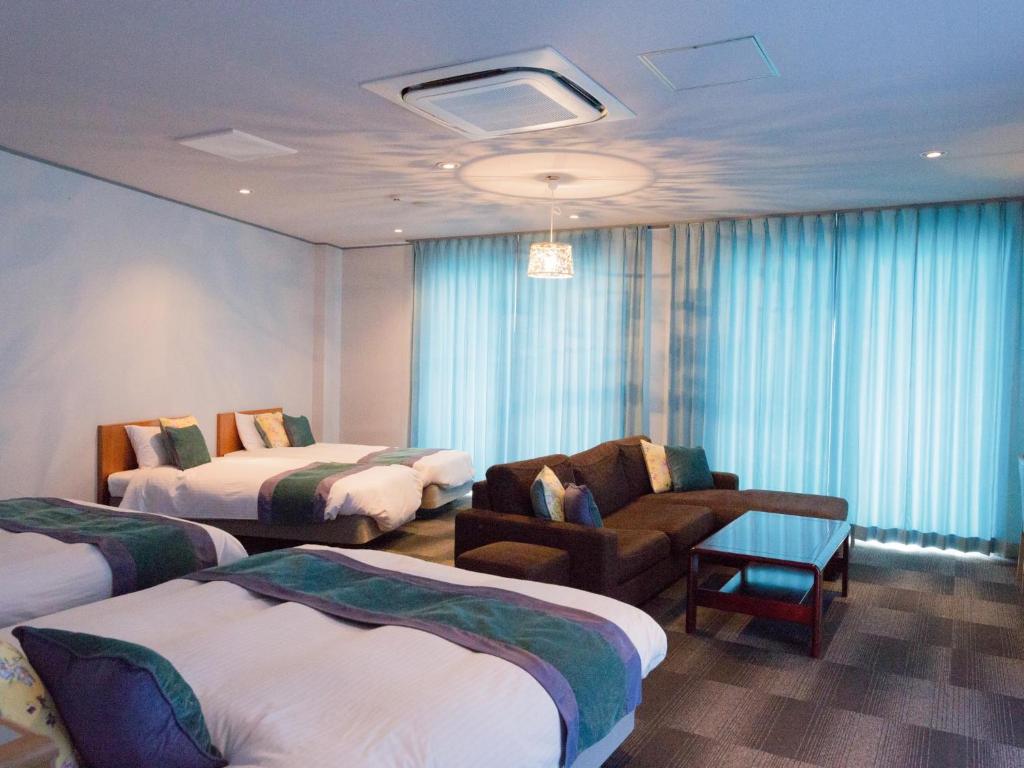 Hotel Caretta - Vierbettzimmer