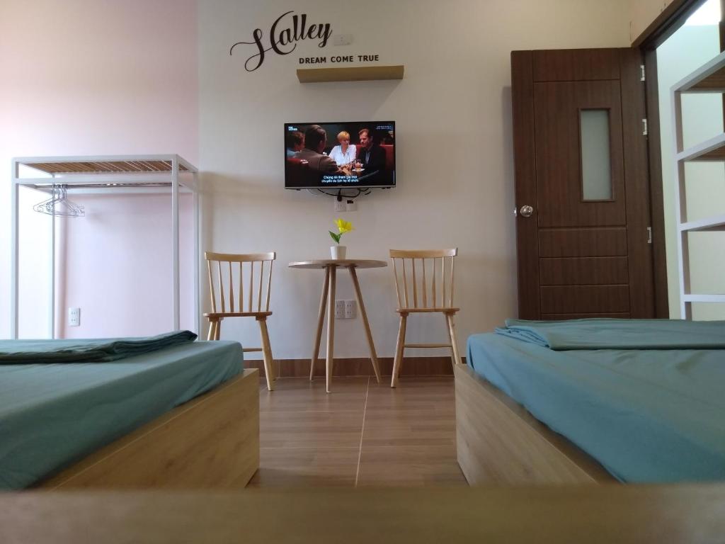 TV a/nebo společenská místnost v ubytování Homestay Halley