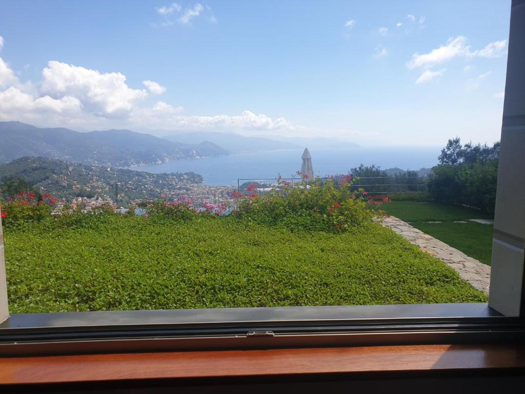 a view of the water from a window at Il Leccio - Luxury Resort Portofino Monte in Santa Margherita Ligure