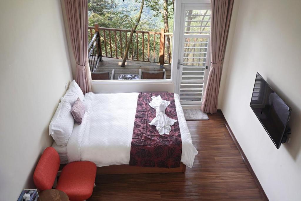 Postel nebo postele na pokoji v ubytování SunSweet House