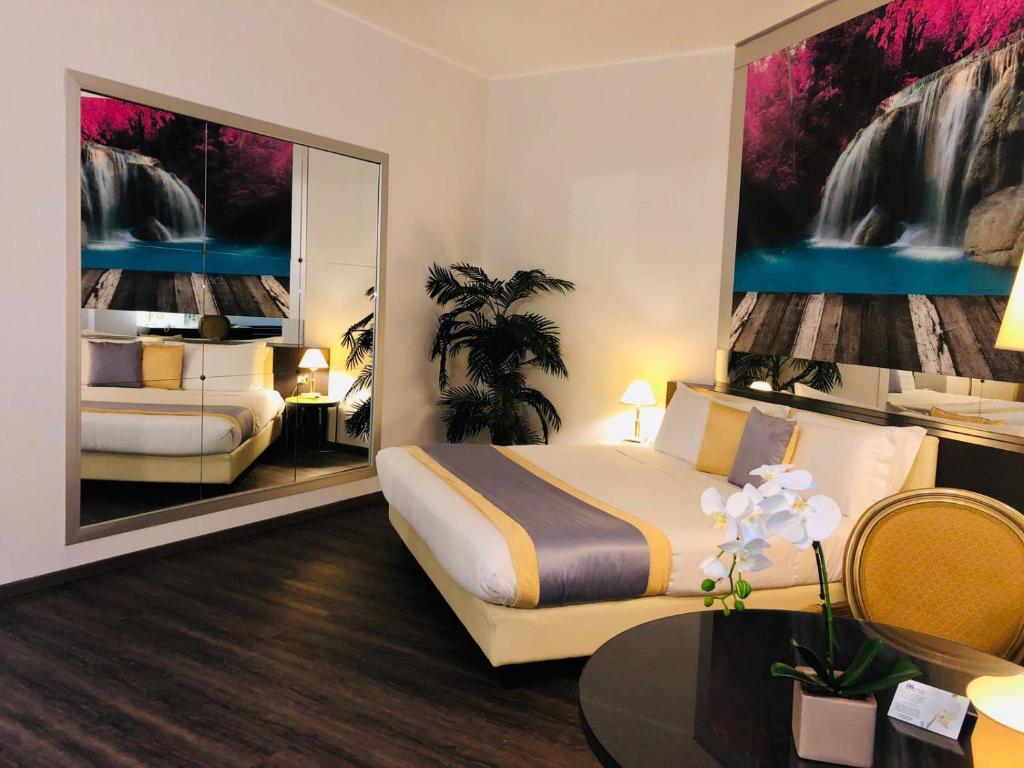 Postel nebo postele na pokoji v ubytování AS Hotel Sempione Fiera