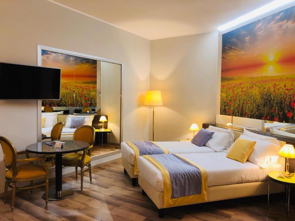 TV a/nebo společenská místnost v ubytování AS Hotel Sempione Fiera