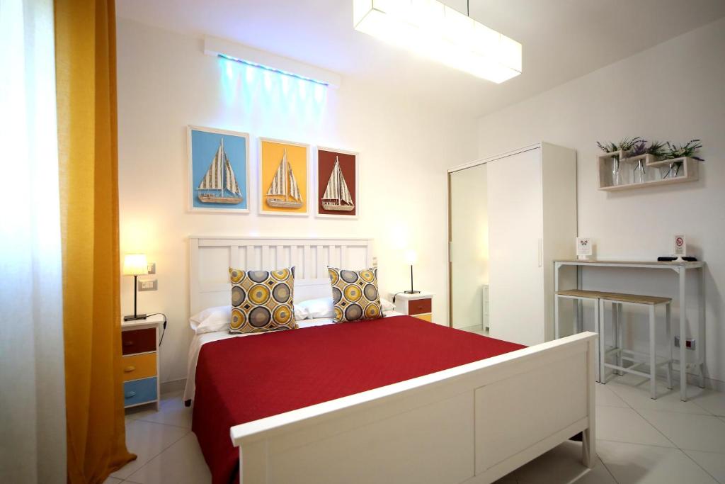 Postel nebo postele na pokoji v ubytování MaLu' B&B