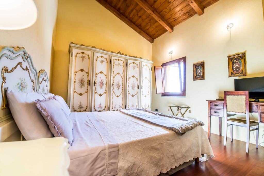 Postel nebo postele na pokoji v ubytování B&b Antica Dimora Quarello