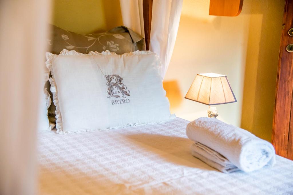 Postel nebo postele na pokoji v ubytování B&b Antica Dimora Quarello
