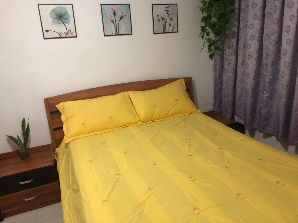 Ένα ή περισσότερα κρεβάτια σε δωμάτιο στο Cozy House