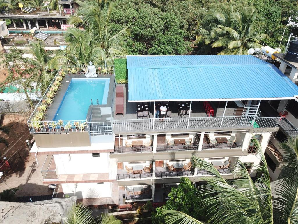 an aerial view of a hotel with a swimming pool at Leisure Cottages in Baga