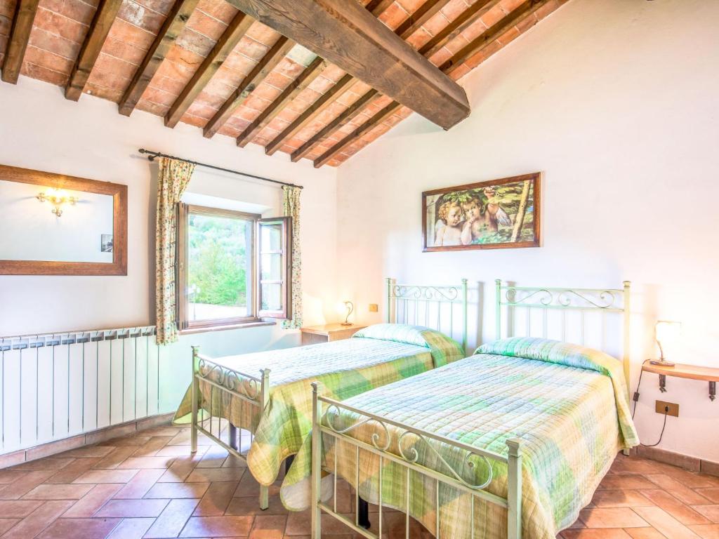 Postel nebo postele na pokoji v ubytování Apartment Montereggi-4 by Interhome