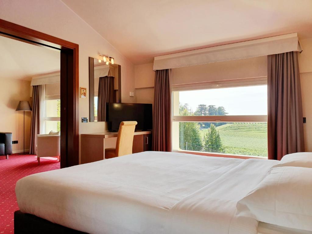 Posteľ alebo postele v izbe v ubytovaní Hotel Ristorante al Giardinetto