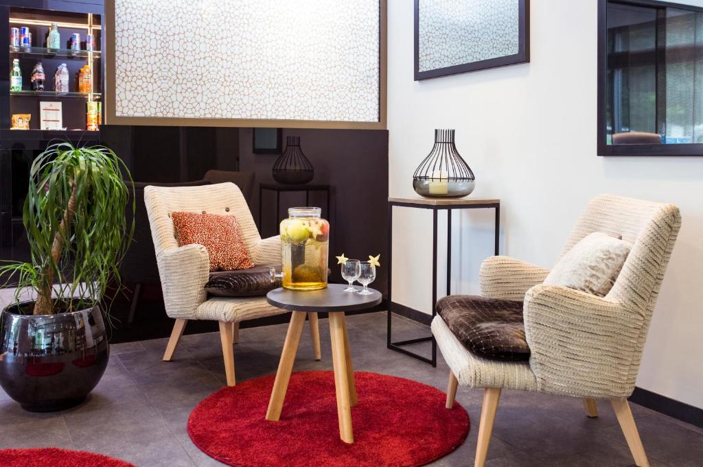 Posezení v ubytování Aparthotel Adagio Genève Mont-Blanc