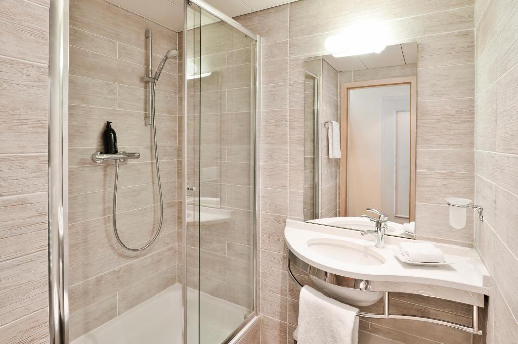 Koupelna v ubytování Aparthotel Adagio Genève Mont-Blanc