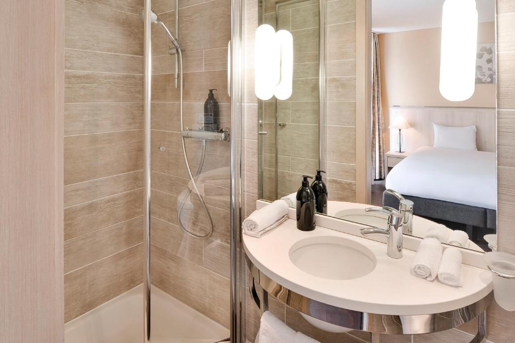 Koupelna v ubytování Aparthotel Adagio Genève Mont-Blanc