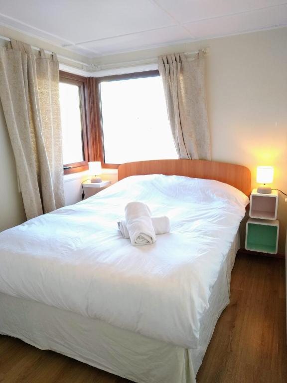 Postel nebo postele na pokoji v ubytování Patagon Backpackers