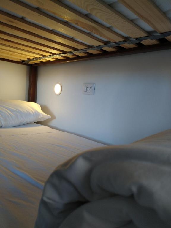 Postel nebo postele na pokoji v ubytování Patagon Backpackers