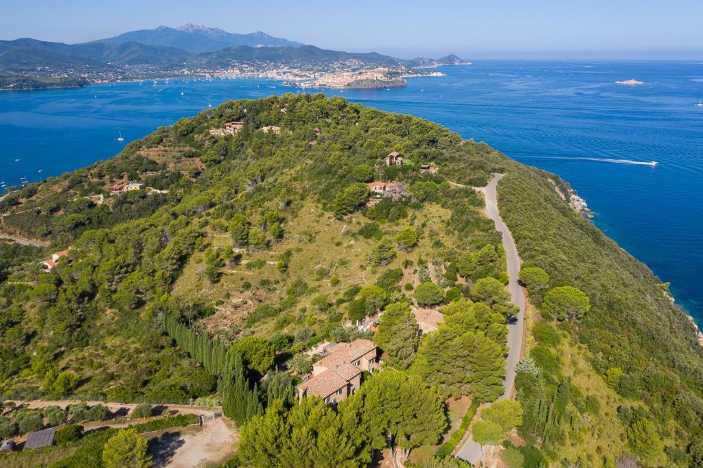 an aerial view of an island in the ocean at Case Danesi in Rio nellʼElba