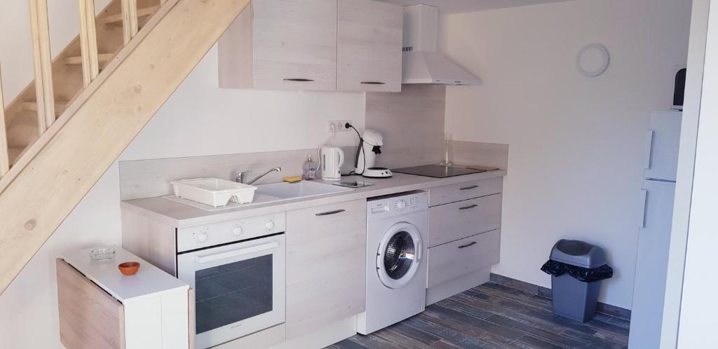 Kuchyň nebo kuchyňský kout v ubytování Mini-villa 1 MER