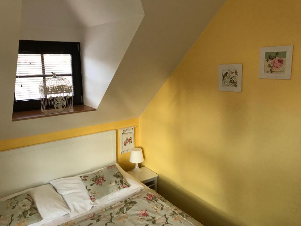 Postel nebo postele na pokoji v ubytování U svatého Urbana