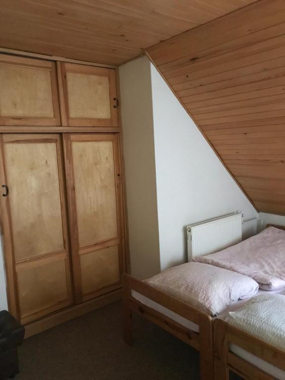 Postel nebo postele na pokoji v ubytování Horský Ranč