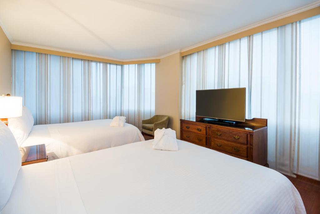 Postel nebo postele na pokoji v ubytování Cosmos 100 Hotel & Centro de Convenciones - Hoteles Cosmos