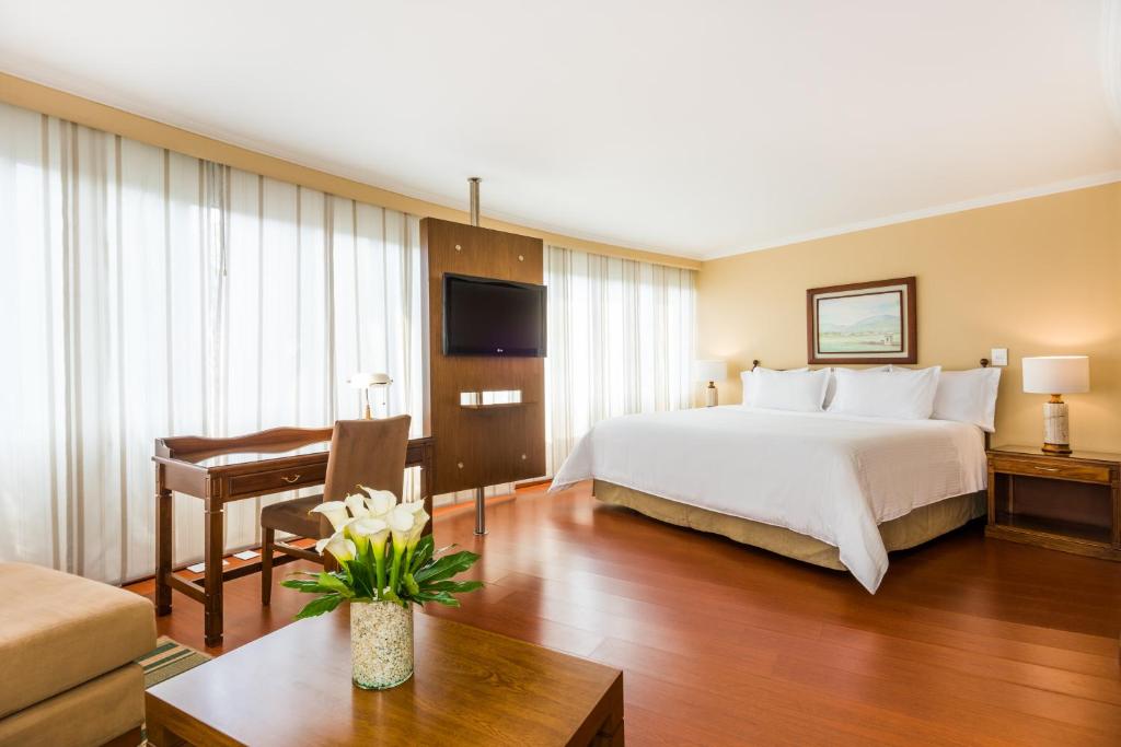 Postel nebo postele na pokoji v ubytování Cosmos 100 Hotel & Centro de Convenciones - Hoteles Cosmos