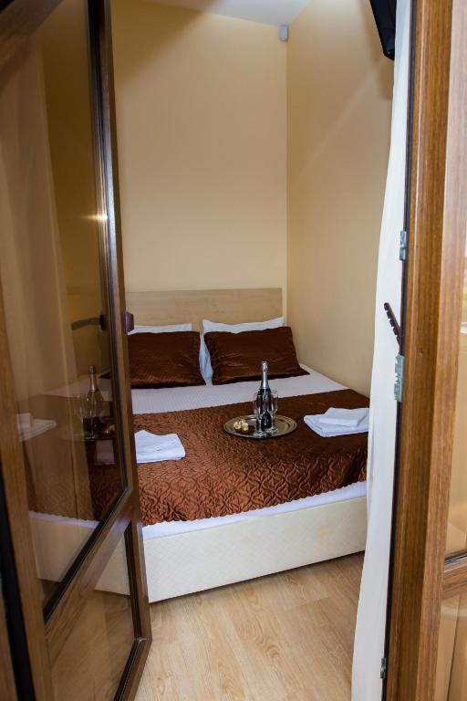 Postel nebo postele na pokoji v ubytování Hotel Sofia