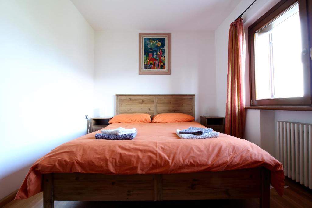 Postel nebo postele na pokoji v ubytování Nonostantetutto B&B