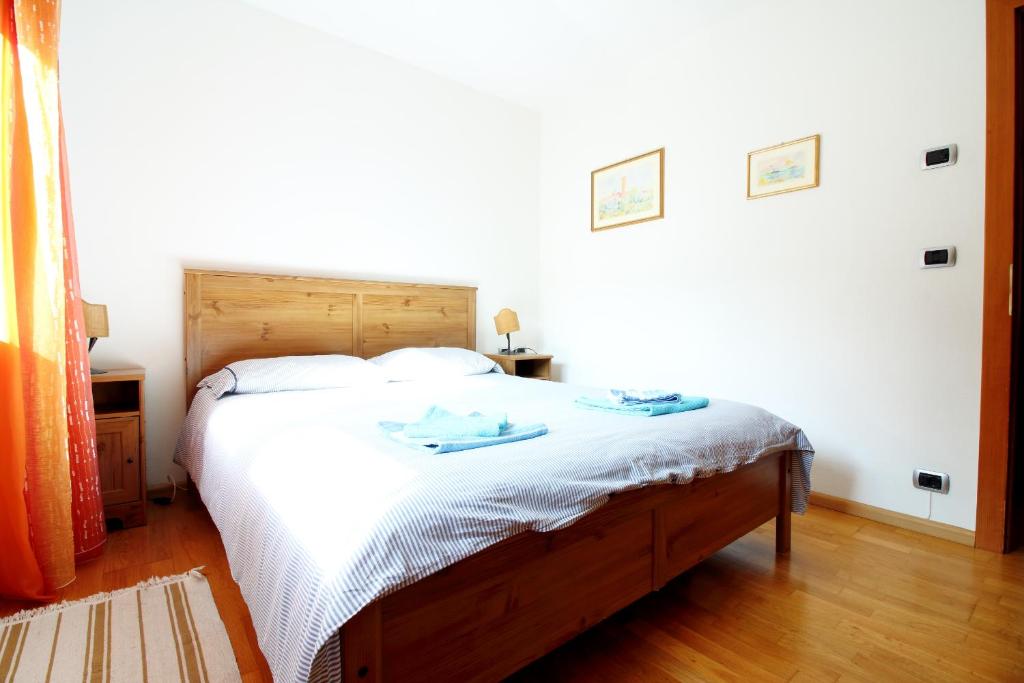 Postel nebo postele na pokoji v ubytování Nonostantetutto B&B