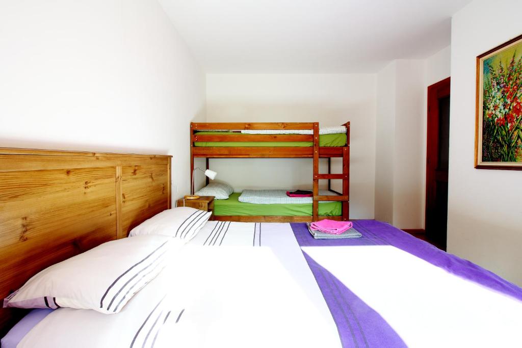 Postel nebo postele na pokoji v ubytování Nonostantetutto B&B