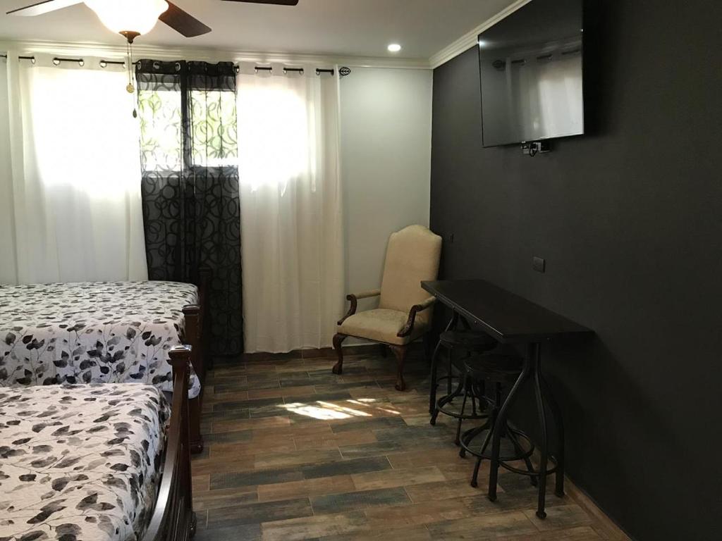 Postel nebo postele na pokoji v ubytování Refugio de la Montaña B&B