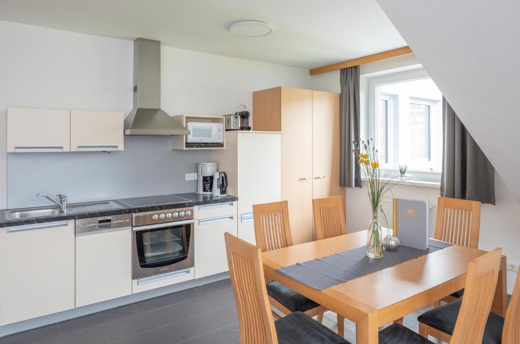 Kuchyň nebo kuchyňský kout v ubytování Sunshine Appartements Schilchegger