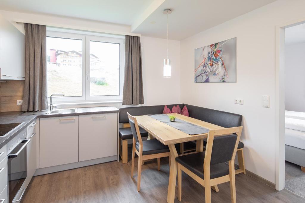 Kuchyň nebo kuchyňský kout v ubytování Sunshine Appartements Schilchegger