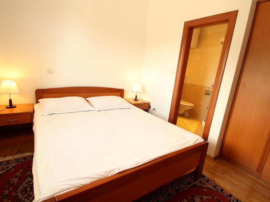 Posteľ alebo postele v izbe v ubytovaní VILLA NEDE
