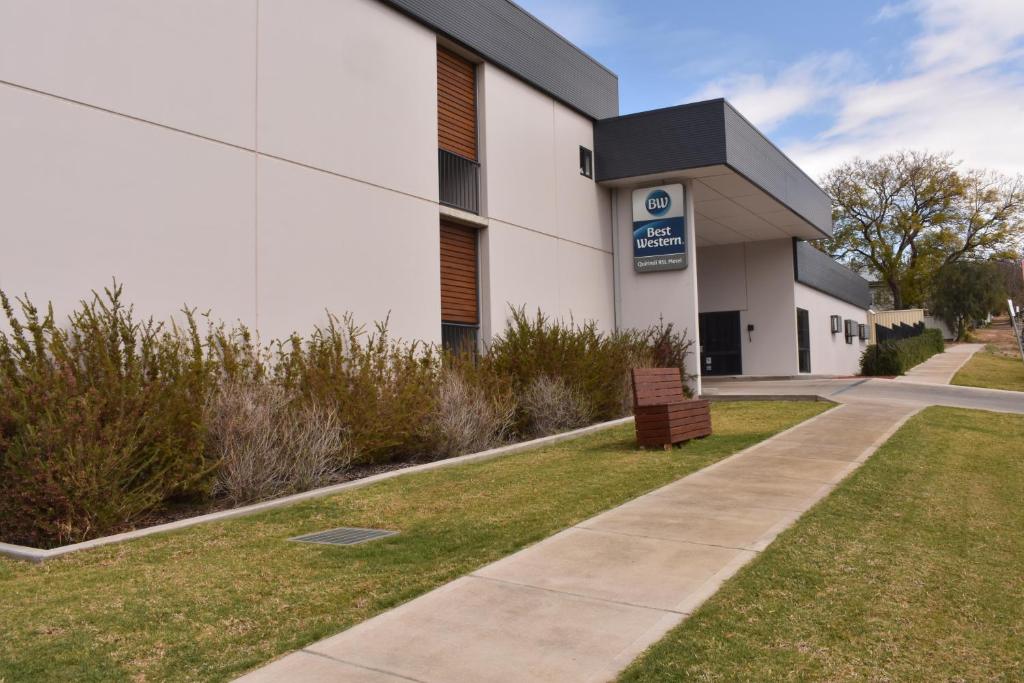 a building with a sign in front of it at Best Western Quirindi RSL Motel in Quirindi