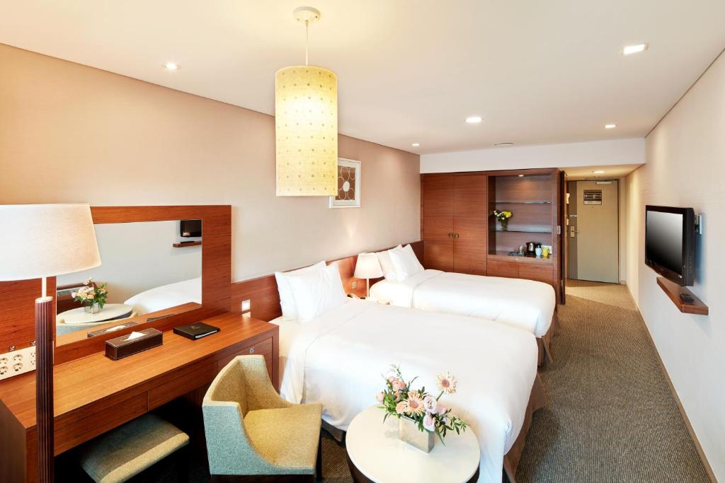 Uma TV ou centro de entretenimento em Hotel PJ Myeongdong