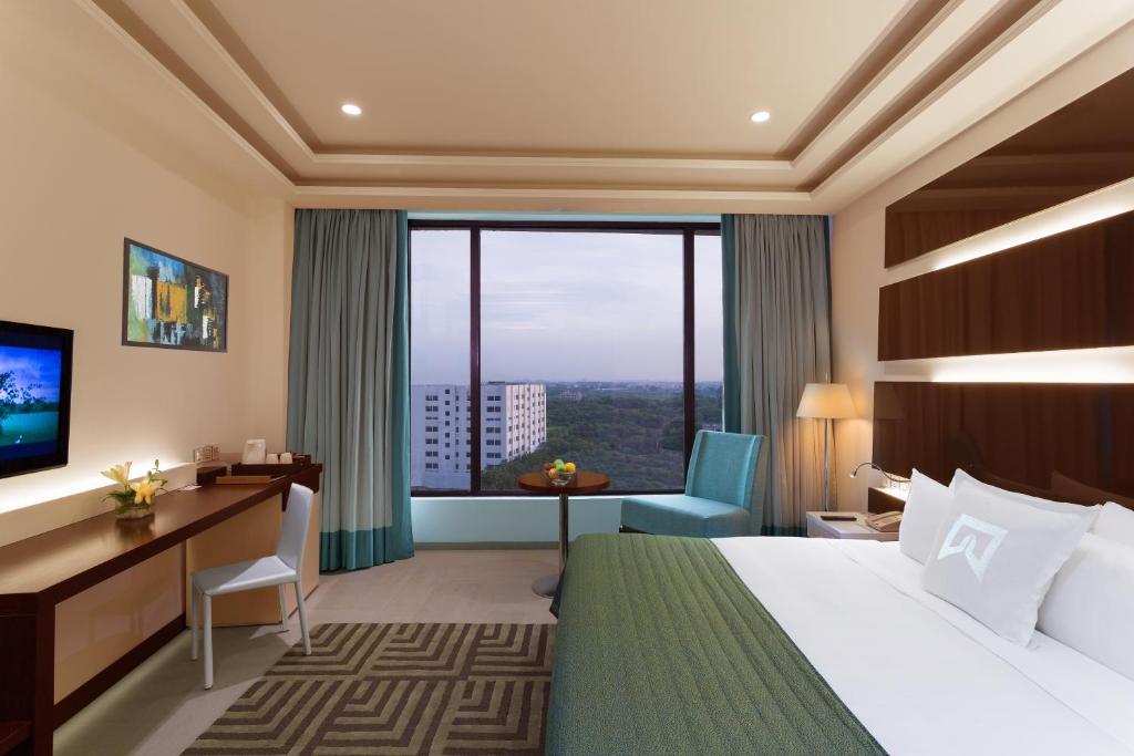 Postel nebo postele na pokoji v ubytování Welcomhotel by ITC Hotels, Dwarka, New Delhi