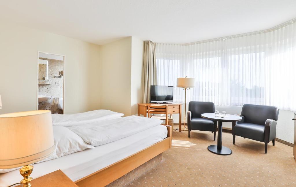 Postel nebo postele na pokoji v ubytování Villa am Meer