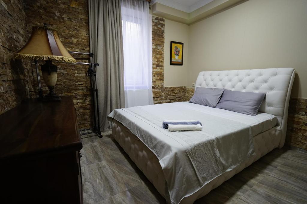 Postel nebo postele na pokoji v ubytování Hotel Daisy S Home